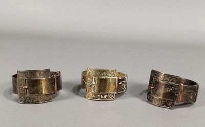 three different types of rings are shown on a table