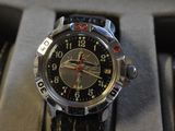 a watch that is sitting in a box on the table