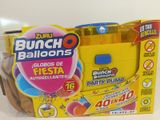 packaging of a bunch of balloons in a box on a table