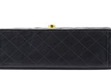 chanel black quilted leather clutch bag