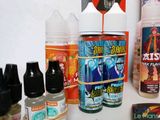 many different flavors of e - liquid on the counter