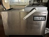 a machine that is sitting inside of a kitchen