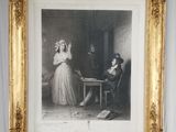 une vieille photo représentant un homme et une femme en train de jouer aux cartes