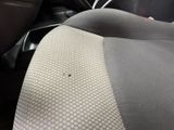 a car seat with a hole in the middle of it