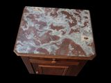 a marble top table with a drawer underneath it