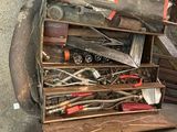 a pile of tools sitting on top of a table