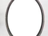 a picture of a round mirror on a white background