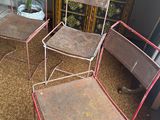 two chairs and a table in a room with a rug