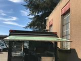a truck that is parked in front of a building