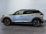 the new nissan kickstart suv is parked in a showroom