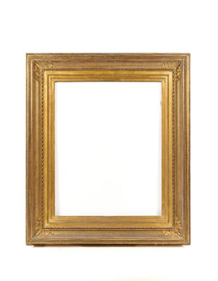 an antique gold frame on a white wall