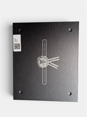 an image of a black book with a clock on it