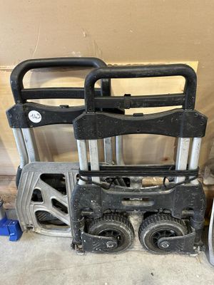 a black and silver hand truck and a black and silver hand truck