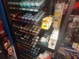 a refrigerator that has a lot of paint on it