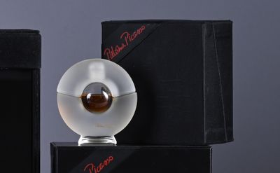 a glass object that is sitting on top of a box
