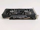 a close up of a video card on a white surface