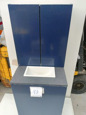 a picture of a blue and white trash can and a blue trash can