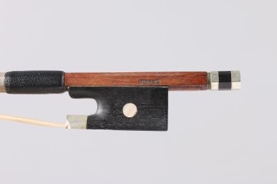 violin bow made of wood and metal with a wooden handle