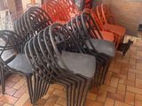 a lot of chairs that are sitting in a room