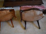 two chairs sitting next to each other in a living room