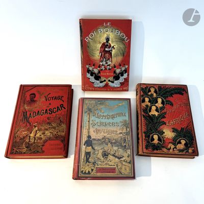 three books are sitting on a white surface, one is red and the other is black
