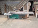 a picture of a table saw in a garage