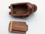 two pieces of wood in the shape of a shoe