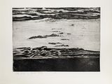 a black and white picture of a beach with waves