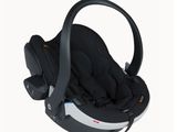 a baby car seat with a handlebar attached to it