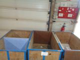 two boxes that are in the middle of a room