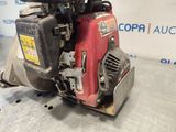 the engine of a small engine is sitting on top of a table