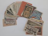 a lot of old paper money on the table