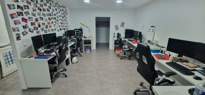 an image of a room with multiple computers and desks