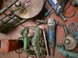 a lot of tools that are sitting on the floor