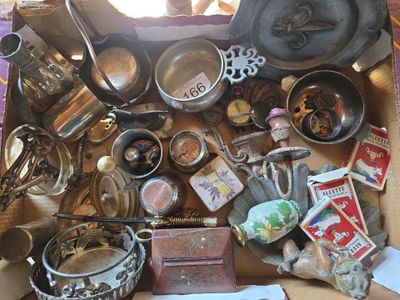 a box full of old kitchen items on a table