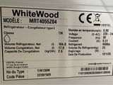 a label on the back of a refrigerator that says whitewood