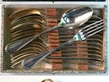 a box of silverware with spoons and spoons in it