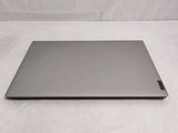 a laptop that is sitting on a white surface