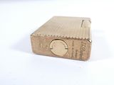 a box with a clock on it sitting on a white surface