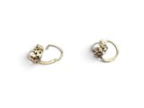 a pair of gold earrings with pearls on a white background