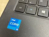 a close up of a computer keyboard with a blue core sticker on it