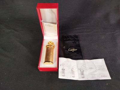 a box with a watch inside of it on a table