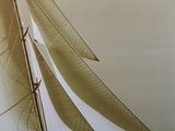 a large sailboat sailing on the water in the ocean