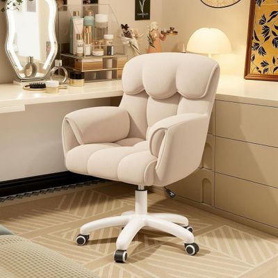 a chair that is sitting in front of a desk