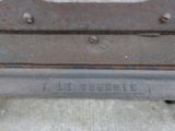 a close up of a piece of metal on the ground