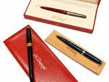 an image of a pen and a pen case on a white background