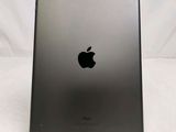 the back of an apple ipad with the apple logo on it