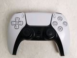 a close up of a video game controller on a table