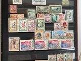 a picture of a collection of stamps displayed on a wall