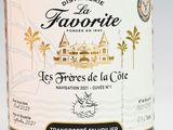 a bottle of wine that is sitting on a table